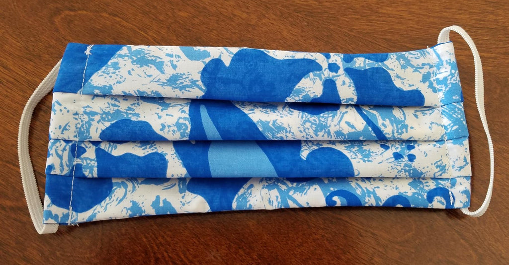 Hand sewn print Fabric Face Masks. Extra long drawstring fits and locks behind head. Eliminates pressure on ears. Washable and reusable Made in USA Package of 3 Masks